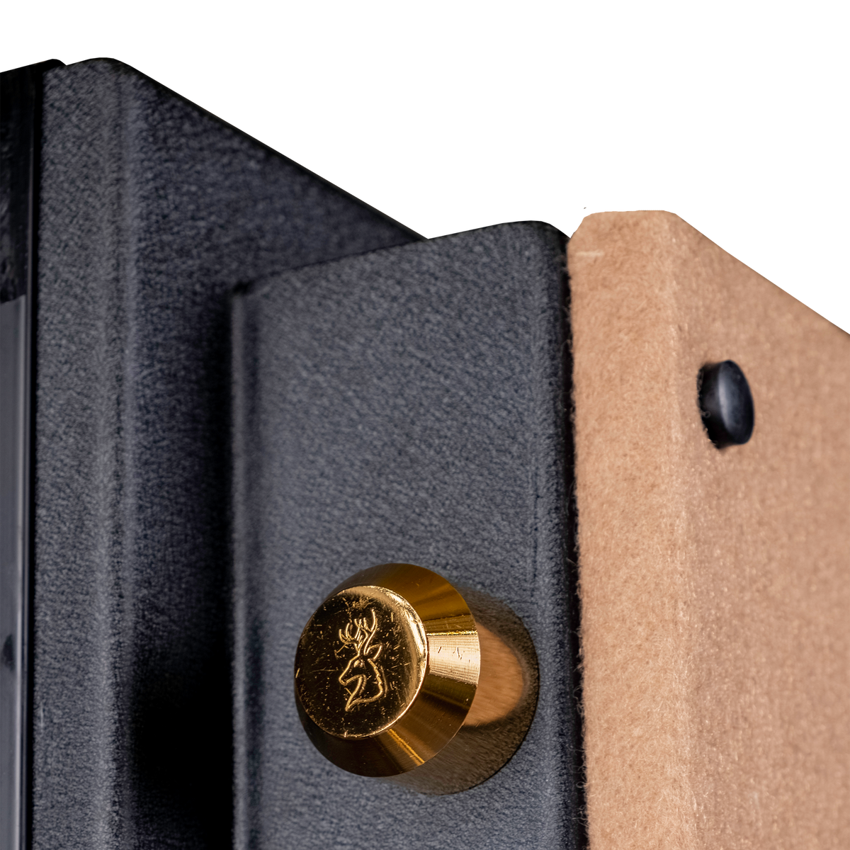 Close-up of a brass stag-stamped locking bolt on the Spika SCB1 home safe door