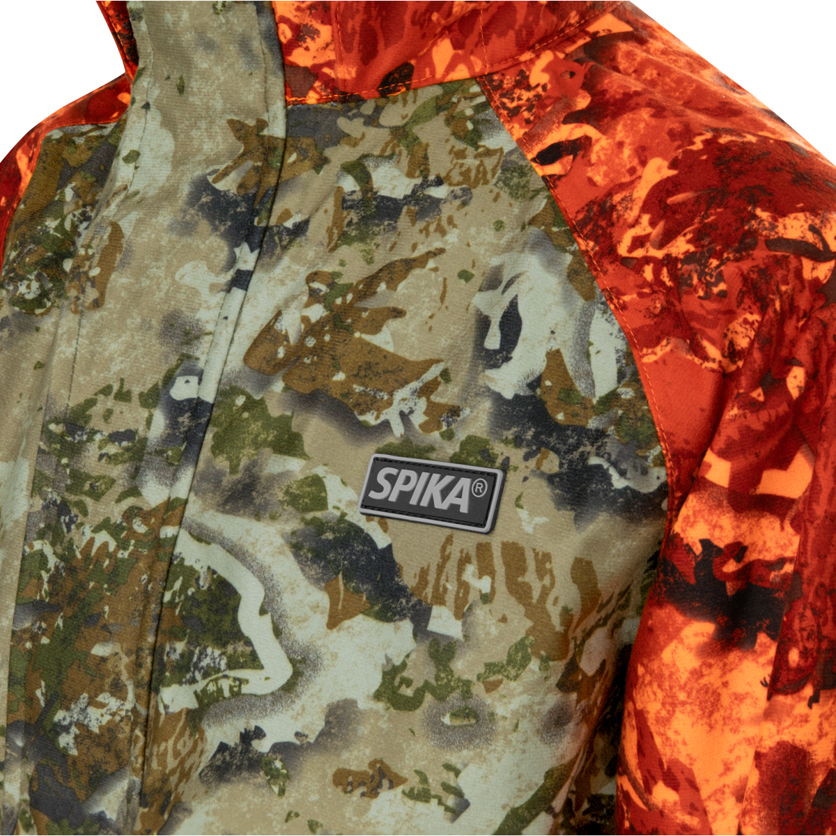 Spika Valley kids' jacket in Biarri Camo/Blaze, close-up of the Spika chest badge and storm flap