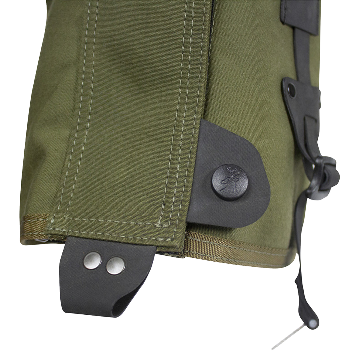 Spika Strike adult gaiter, close-up of the lower snap, boot hook and steel instep cable