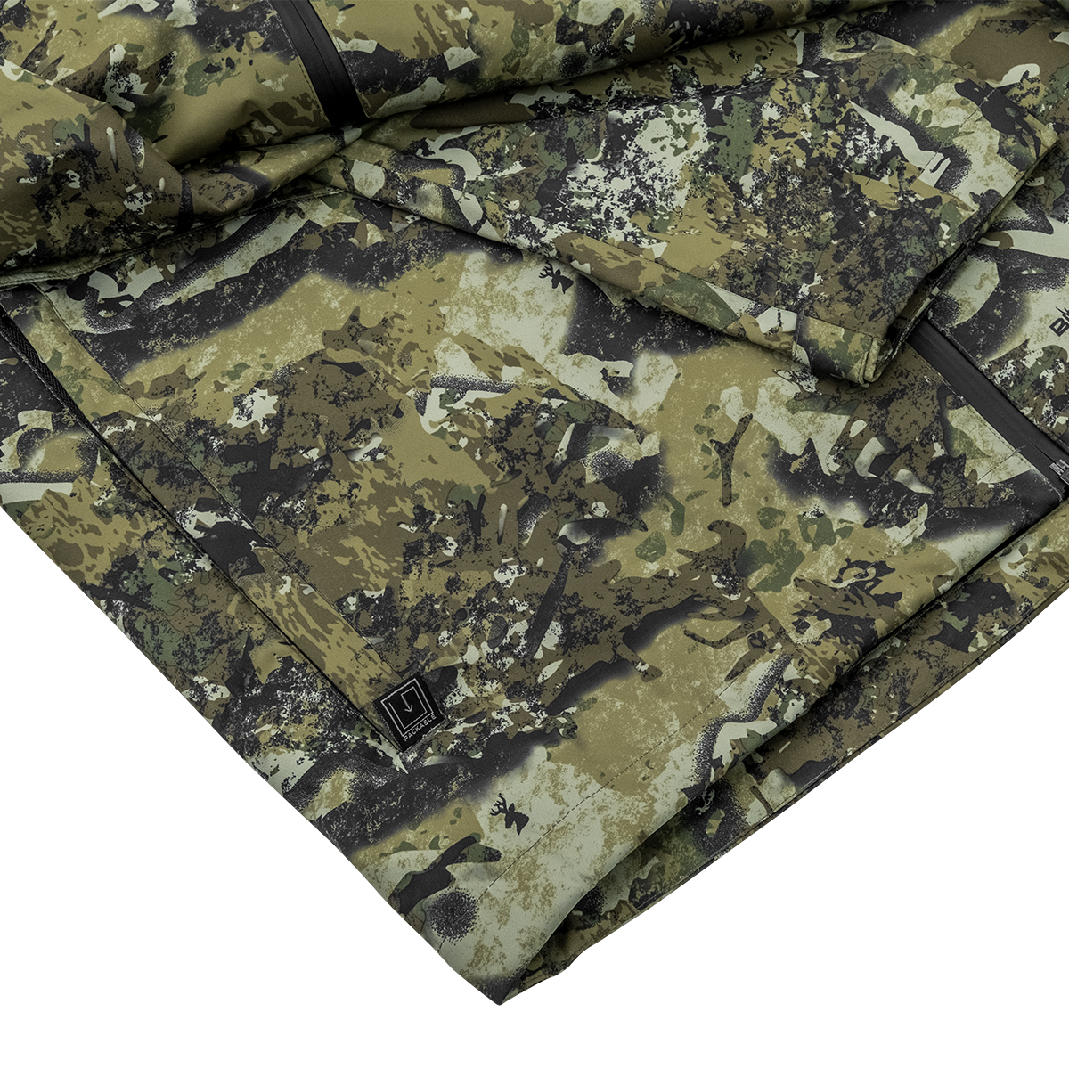 Spika Scout men's jacket in Biarri Camo, close-up of folded fabric and hem with logo tab
