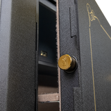 Close-up of the Spika SCH2 safe door edge with brass stag-stamped locking bolt