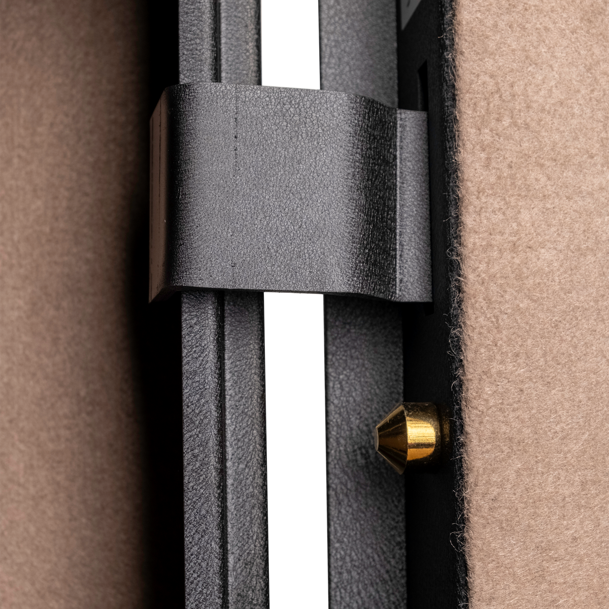 Close-up of the Spika SCH2 safe interior strap bracket and brass locking bolt