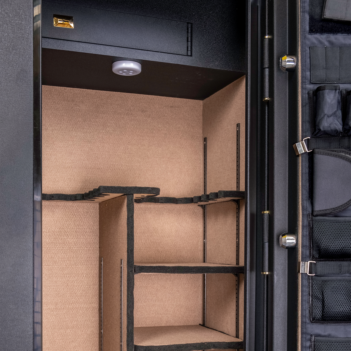 Close-up of the Spika SFB1 safe interior with LED light, top lockbox and rifle rack