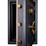 Close-up of the Spika SCB1 home safe door edge with brass locking bolts, keypad and handle