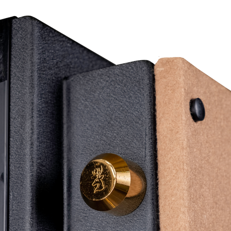 Close-up of a brass stag-stamped locking bolt on the Spika SCB1 home safe door