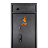 Close-up of the Spika S3 gun safe door with orange stag logo, key lock and handle