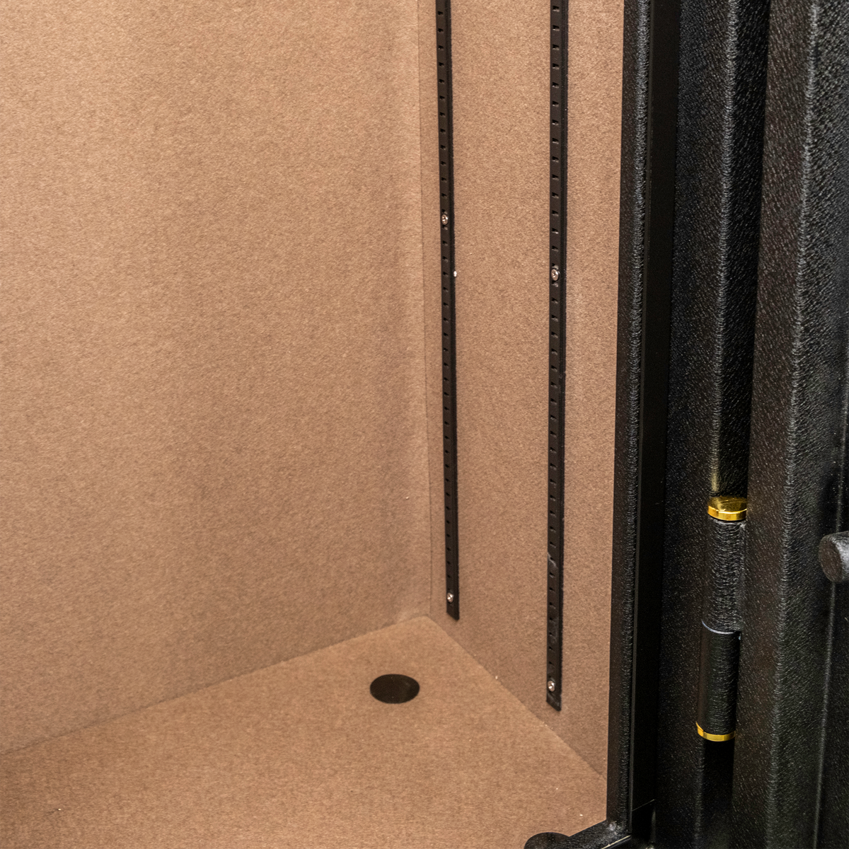 Close-up of the Spika SFABH safe tan-lined interior with adjustable rails