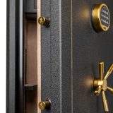 Close-up of the Spika SFABH safe keypad, brass spoke handle and locking bolts
