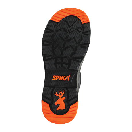 Spika Bruzer men's gumboot outsole showing the deep lug tread and orange heel with stag logo