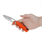 Spika Bushmaster Tango folding knife held in hand to show the orange grip and blade length
