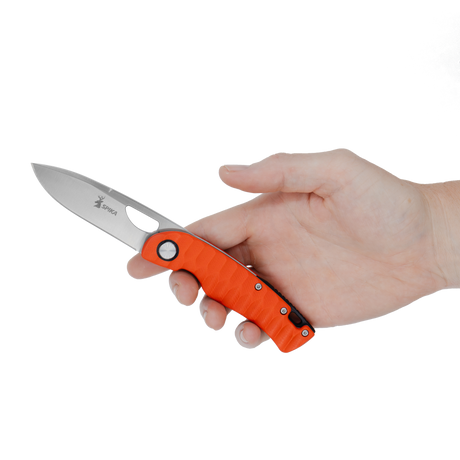 Spika Bushmaster Tango folding knife held in hand to show the orange grip and blade length