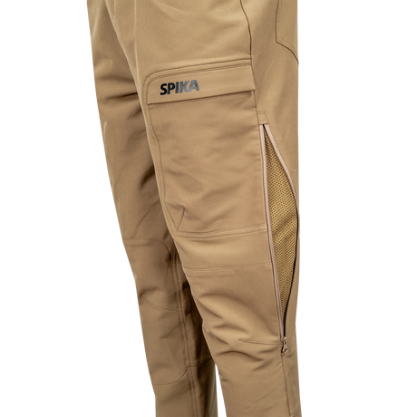 Spika Recon men's pants in Khaki, angled close-up of cargo pocket logo and open leg vent zip