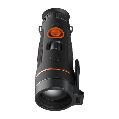 ThermTec Wild 635 thermal monocular, top view from the eyepiece with lens cap open over the lens