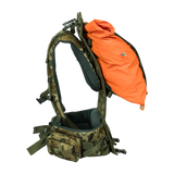 Spika Drover II Hauler frame in Biarri Camo, side view with an orange load bag held between frame and harness