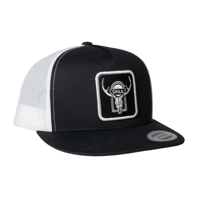 Spika High Country Sambar patch trucker cap in Black/White, three-quarter view with flat brim