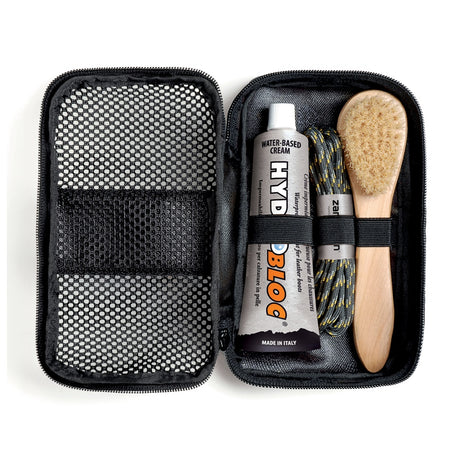 Zamberlan boot cleaning kit open, showing Hydrobloc cream, spare laces and brush in zip case