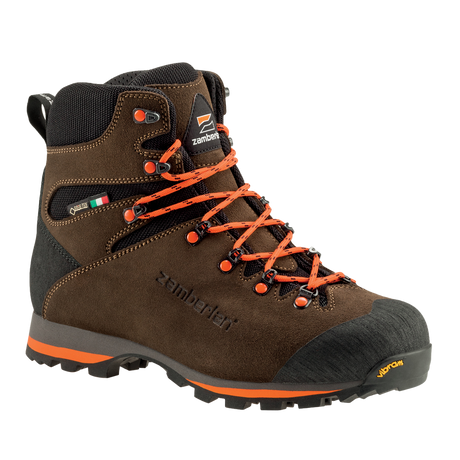 Zamberlan 1103 Storm GTX men's hiking boot in dark brown and orange, three-quarter front view with orange laces