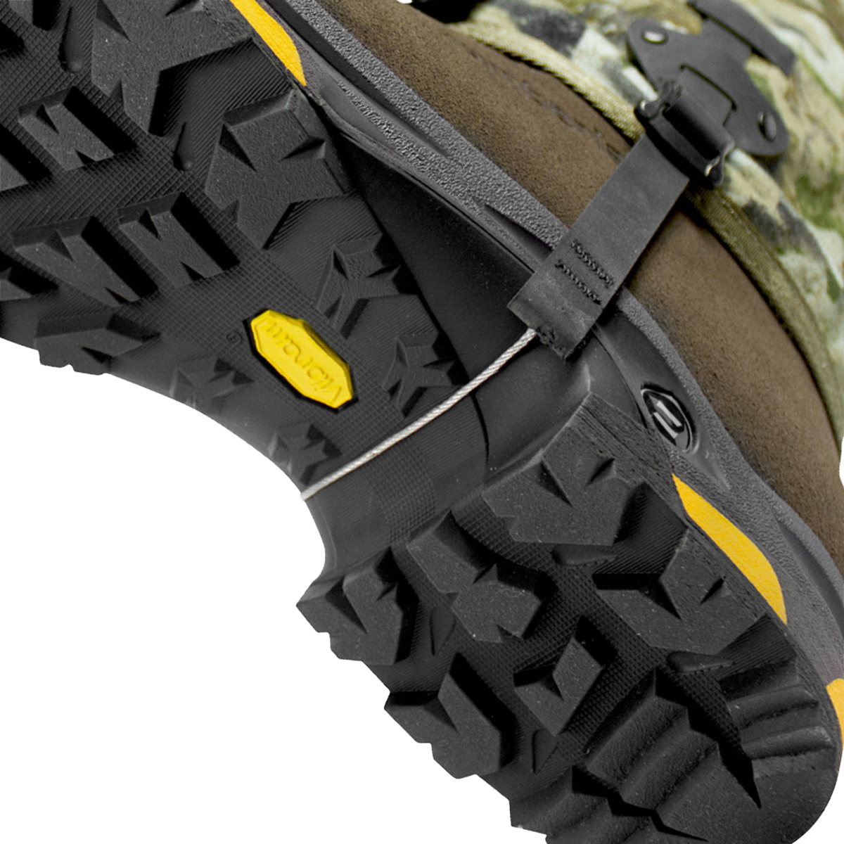Spika Ranger adult gaiter, close-up of the stirrup wire running under a boot's Vibram sole