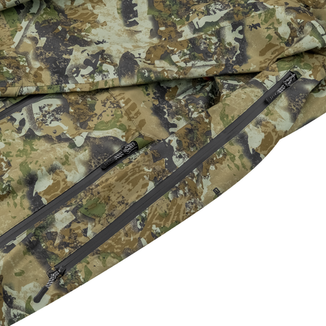 Spika Edge men's Biarri Camo jacket close-up of the zipped hem pockets and drawcord toggles