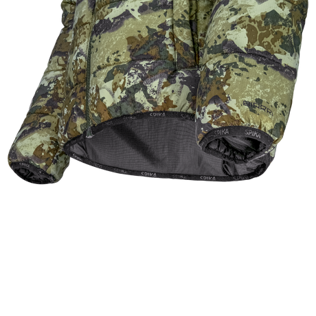 Spika Terra kids' puffer jacket in Biarri Camo/Blaze, close-up of the elastic hem and cuffs