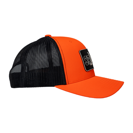 Spika Cast Antler patch trucker cap in Blaze/Charcoal, side view of blaze front and mesh