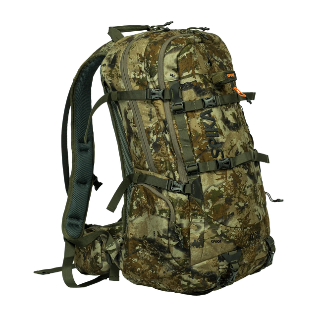 Spika Drover II Pro Pack 35L in Biarri Camo, three-quarter front view with compression straps and zip pockets
