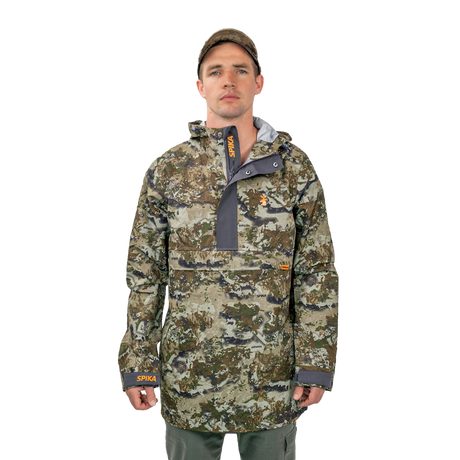 Man wearing the Spika Buckland Biarri Camo hunting smock with hood down and cap, front view