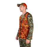 Hunter wearing the Spika Ranger vest in Biarri Blaze with a blaze cap, three-quarter view