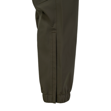 Spika Reign women's pants in Olive Summit, close-up of the side ankle zip closed
