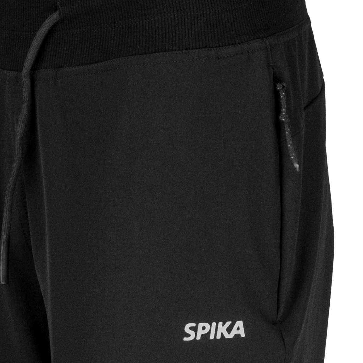 Close-up of the zip side pocket, drawcord and SPIKA print on Spika GO Casual women's black joggers
