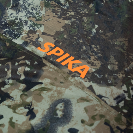 Spika Bandit men's hoodie in Biarri Camo, close-up of the orange Spika shoulder logo