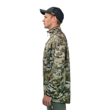 Man wearing the Spika Guide men's lightweight top in Biarri Camo, side profile view