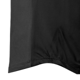 Close-up of the stitched curved hem and mesh side panel on the Spika GO AVP women's black half-zip