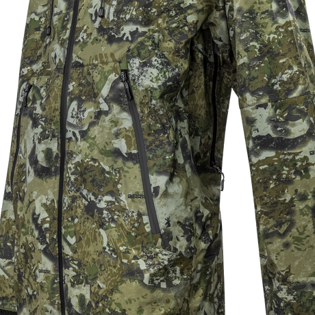 Spika Edge men's jacket close-up of the Biarri Camo fabric with vertical zip pockets and pit zip