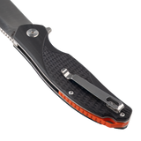 Close-up of the Spika Bushmaster Raider handle back with steel pocket clip and orange liner edge