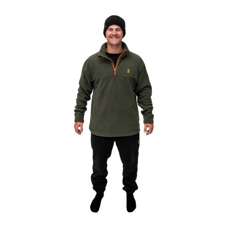 Man wearing the Spika olive quarter-zip fleece, black track pants and beanie from the 6 Piece Box Pack