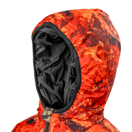 Spika Terra kids' puffer jacket in Biarri Camo/Blaze, close-up of the blaze orange hood and lining