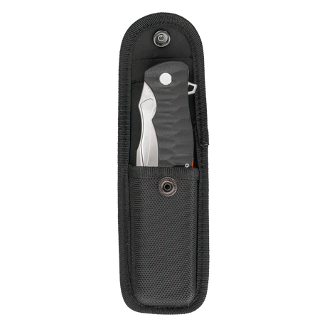 Spika Bushmaster Viper folding knife sitting in its open black nylon belt pouch, flap lifted