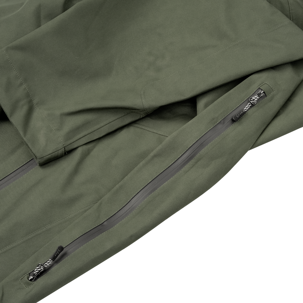 Spika Edge men's Olive jacket close-up of the sealed zip hem pocket and sleeve