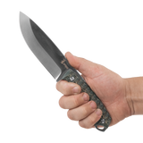 Spika Bushmaster Dogtooth fixed blade knife held in hand to show grip fit and blade length