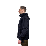Man wearing the Spika GO men's softshell jacket in Black, side profile showing the hood