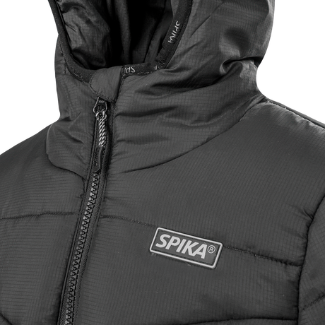 Spika Terra kids' puffer jacket in Black, close-up of the collar, front zip and Spika chest badge