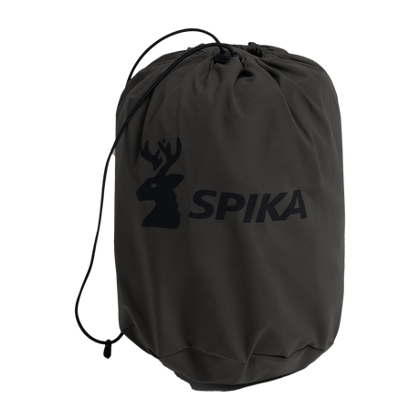 Spika Reign women's pants packed into the olive drawstring stuff sack with Spika deer logo
