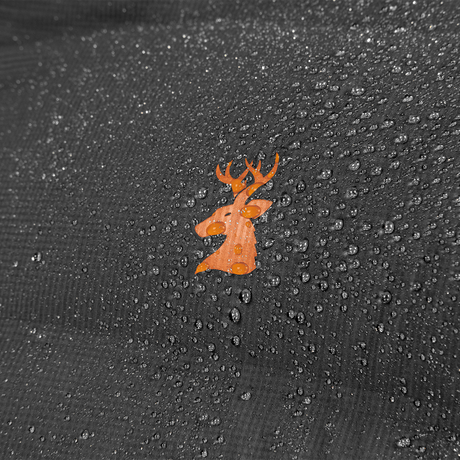 Spika Terra men's puffer jacket in Black, close-up of water beading on the shell around the stag logo