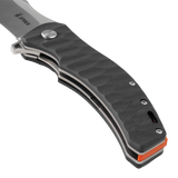 Close-up of the Spika Bushmaster Viper handle front, wave-textured scale, pivot and steel liners
