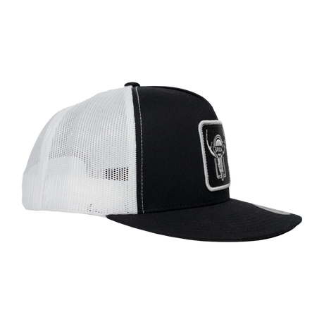 Spika High Country Sambar patch trucker cap in Black/White, side view of white mesh panels