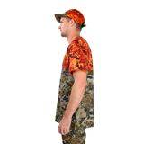 Man modelling the Spika Trail men's T-shirt in Biarri Blaze, side profile view