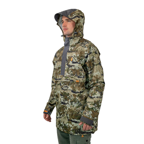 Model wearing the Spika Buckland Biarri Camo jacket with hood up, three-quarter view