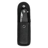 Spika Bushmaster Raider folding knife sitting in its open black nylon belt pouch, flap lifted