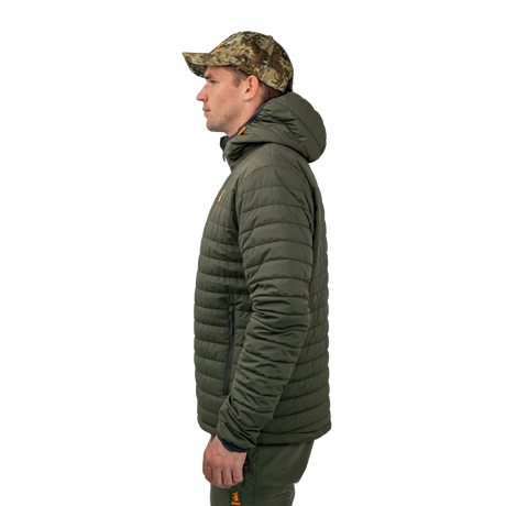 Model wearing the Spika Chase men's Olive quilted puffer jacket, side profile view